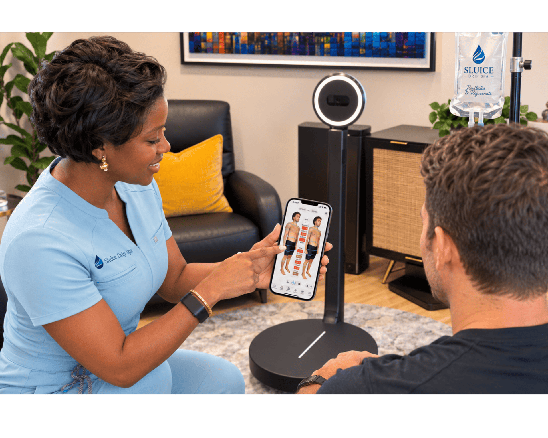 Lola Peterson reviewing a body composition scan with a client